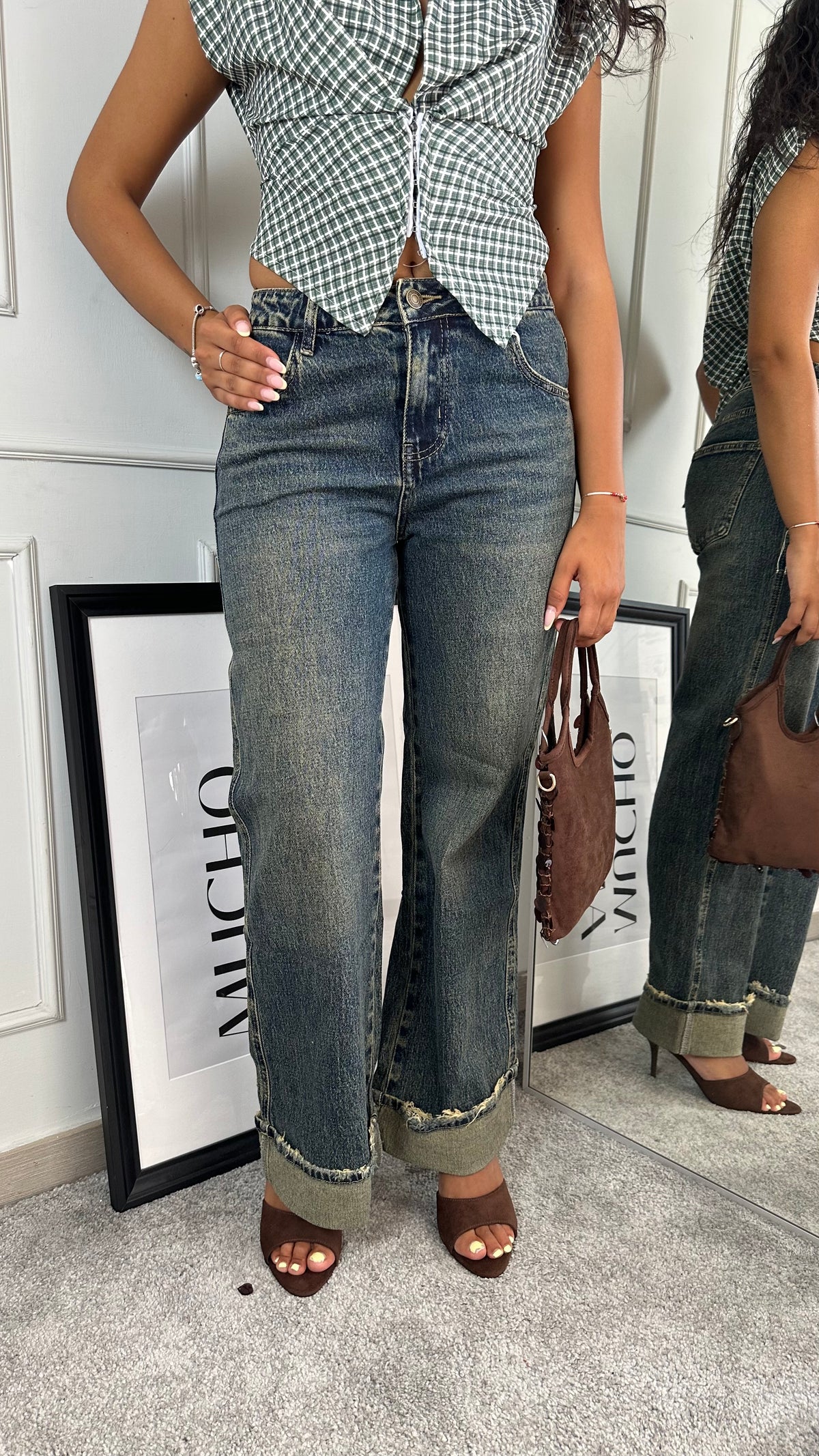Jeans sabbiato con piegone